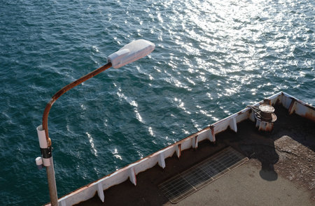 A rusty streetlight on a pier in Naoshima, Japanの写真素材