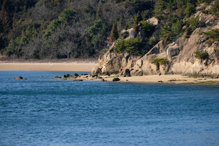View on the island coastline from a ferry boatの写真素材