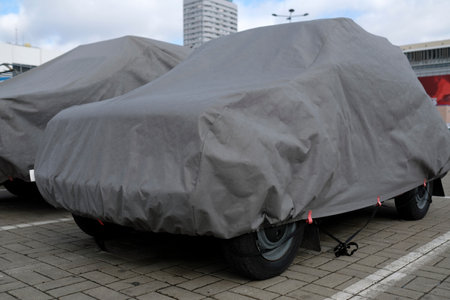 Covered cars on a parking lot in Warsaw, Polandの写真素材