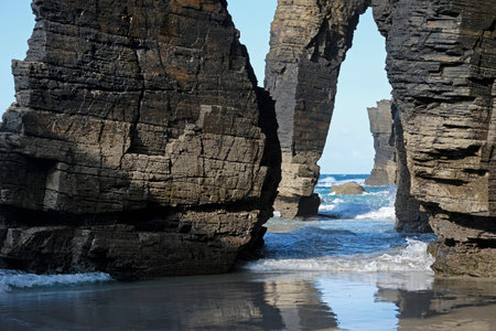 Rock formation at Playa de las Catedrales in Galicia, Spainの写真素材