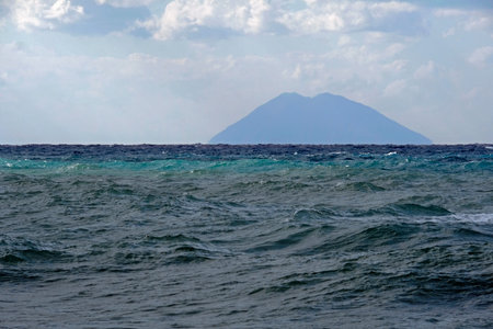 Stromboli seen from the coast of Tropeaの写真素材