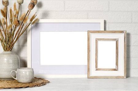 Mock up picture frames with dry plants and mug