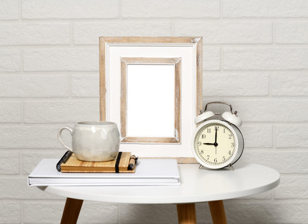White picture frame with home items