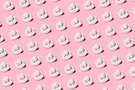 Pattern of white ducks on pink backgroundの写真素材
