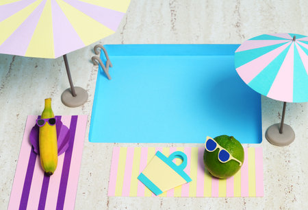 Conceptual image of banana e lime by the pool