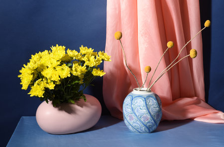 Beautiful yellow flowers on blue backgroundの写真素材