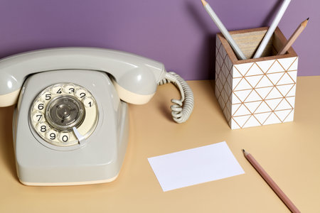 Empty business card with vintage office accessories
