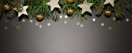 Christmas golden colored decoration on gray background