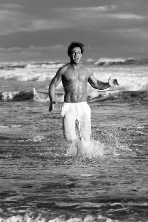 man run on the sea の写真素材