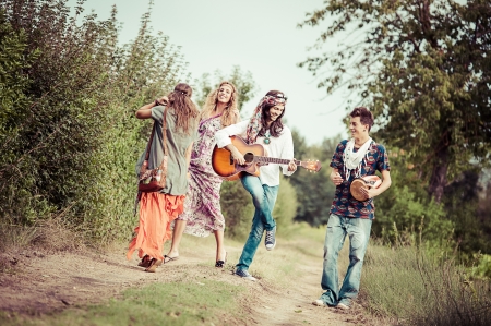 Hippie Group Dancing in the Countryside,Italyの写真素材