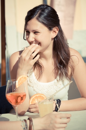 Happy Young Woman Drinking , Italyの写真素材