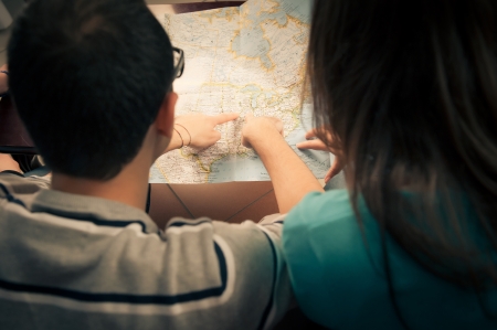 Looking directions on the mapの写真素材