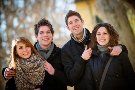 Group of Friends Embraced Outdoor,Italyの写真素材
