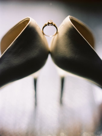 Engagement ring with elegant bridal shoes, close up with copy spaceの写真素材