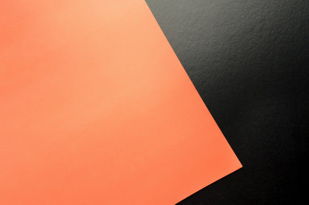 Geometry textured paper background; minimal concept. Orange and black colors. Abstract and creative flat layout with copy space.の写真素材
