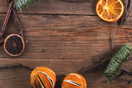 Christmas decoration - orange, sticks, pine - on the wood textureの写真素材