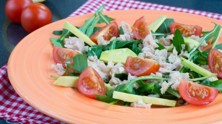 Salad with augula, cherry tomatoes, avocado and tunaの写真素材