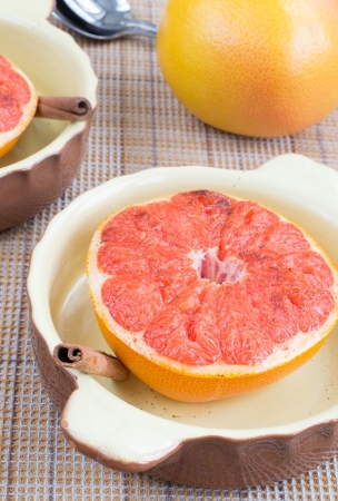 Grapefruit baked with sugar and cinnamon の写真素材