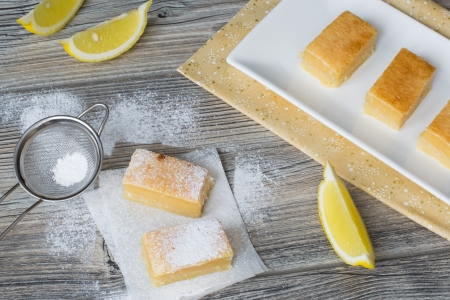 Tasty lemon cake cut in squares の写真素材