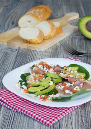 Tasty salad with avocado and jamon の写真素材