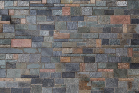 Background of processed geometric stones with different colors of warm and cold colors with clear...