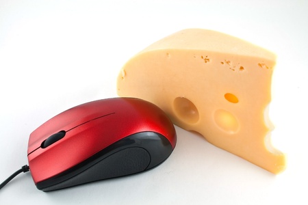 Computer mouse also loves cheeseの写真素材