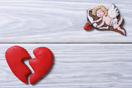 Cupid and a broken heart  Frame of cookies on Valentine s Dayの写真素材