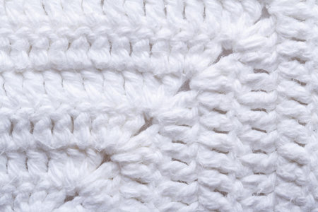 knitted texture white fabric close up
