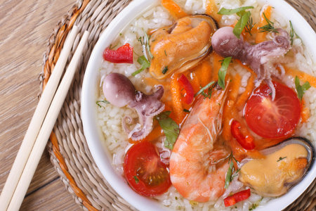 Asian seafood soup close-up on the table. top viewの写真素材