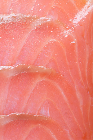 Salmon fillet slices macro vertical.
