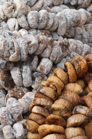 Background of sun-dried and dried figs closeupの写真素材