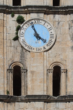 Ancient clock tower of St Nicholas Church, Perast town, Montenegroの写真素材