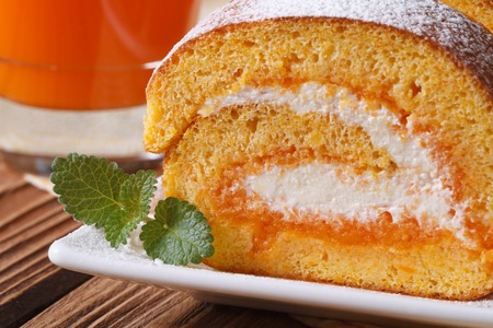 pumpkin roll with cream cheese macro on the table, horizontalの写真素材