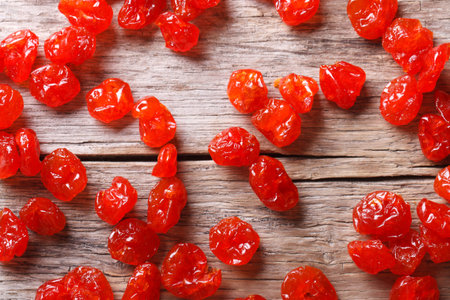 Dried red cherry close up on an old table. horizontal top viewの写真素材