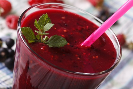 Fresh berry smoothie in a glass macro. horizontalの写真素材