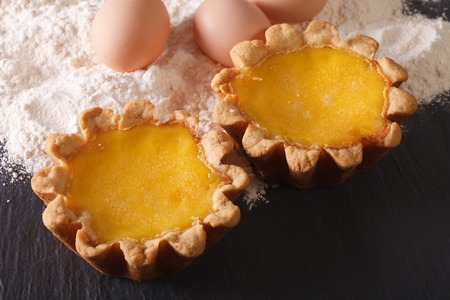 Beautiful Egg Tart and ingredients on the table close-up. horizontalの写真素材