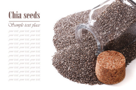 Useful Chia seeds scattered close up isolated on white background.の写真素材