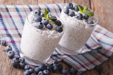 Healthy breakfast: dessert with chia seeds and blueberries close-up on the table.の写真素材