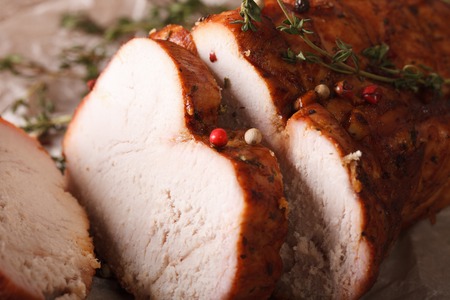 Homemade sliced roasted turkey breast macro. horizontalの写真素材