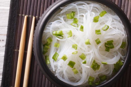 Chinese cellophane noodles close up in a bowl on the table. horizontal view from aboveの写真素材