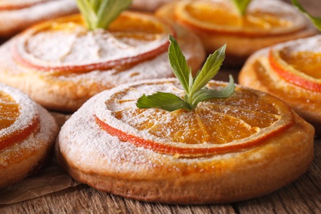 Homemade cookies with almonds and oranges macro on the table. Horizontalの写真素材