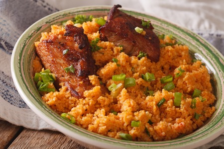 Pilaf bulgur with beef close-up on a plate on the table. horizontalの写真素材