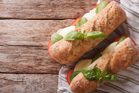 Italian caprese sandwich macro on the table. Horizontal view from aboveの写真素材