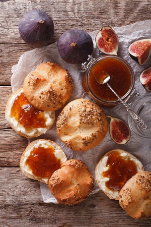 Sweet sandwiches with fig jam and mascarpone close-up on the table. vertical view from aboveの写真素材