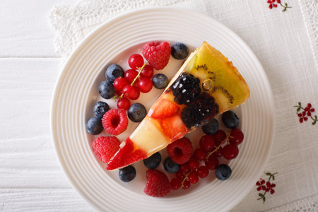 delicious piece of fruit cake jelly close-up on a plate. horizontal view from above