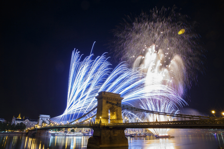 Fireworks in the night sky of Budapest. View of the illuminated Chain Bridge. Hungaryの写真素材