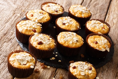 Low-calorie muffins of oatmeal with raisins and honey close-up on the table. horizontalの写真素材