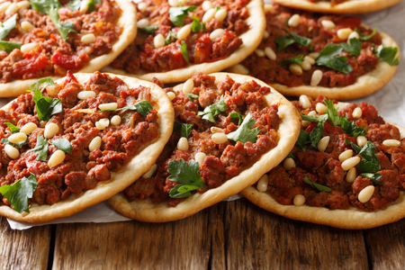 arabic food Esfiha mini pizza with meat and pine nut closeup on the table. Horizontal
の写真素材