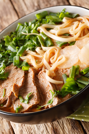 Lanzhou Beef Noodle Soup closeup in a bowl on the table. verticalの写真素材