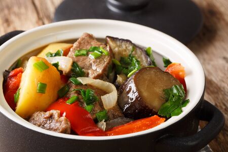 Chanakhi beef with Georgian vegetables in a pot close-up on the table. horizontal
の写真素材